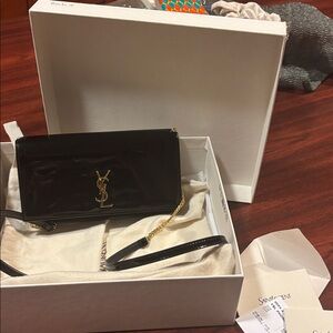 Yves Saint Laurent Black Clutch with Gold Logo